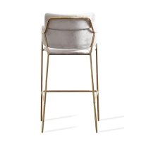 Tabouret haut rembourré avec pieds dorés
